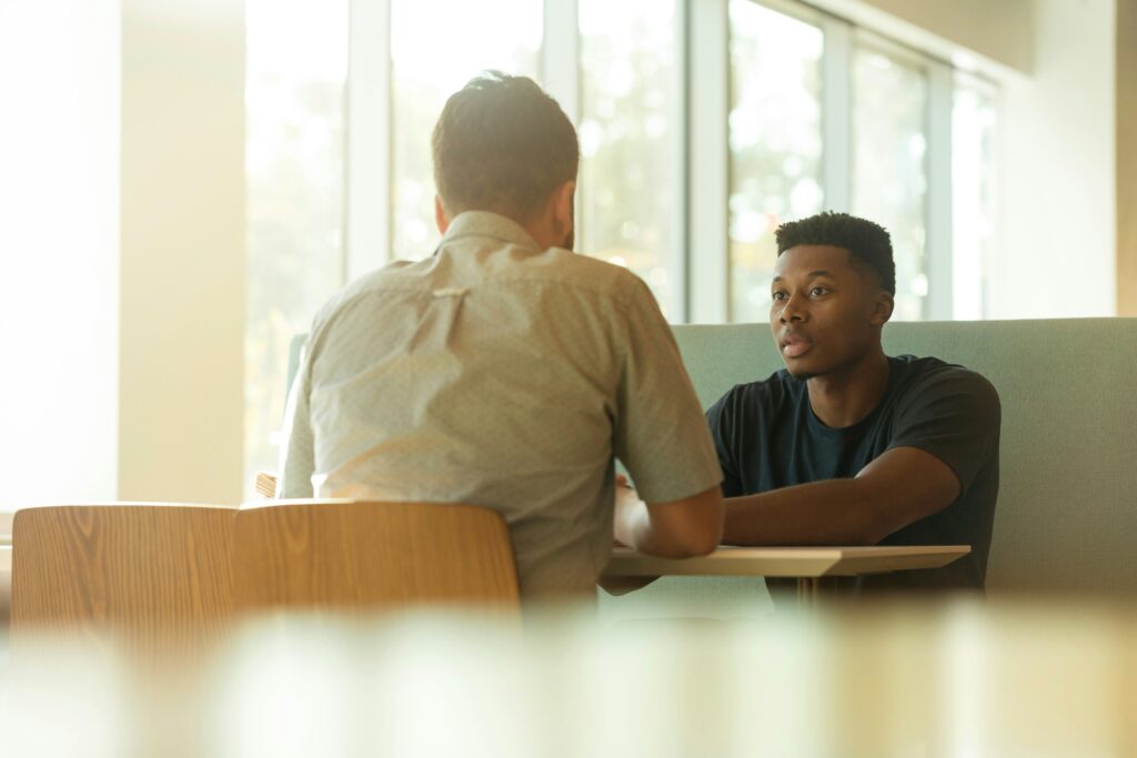 Two men discussing how to approach channel conflict